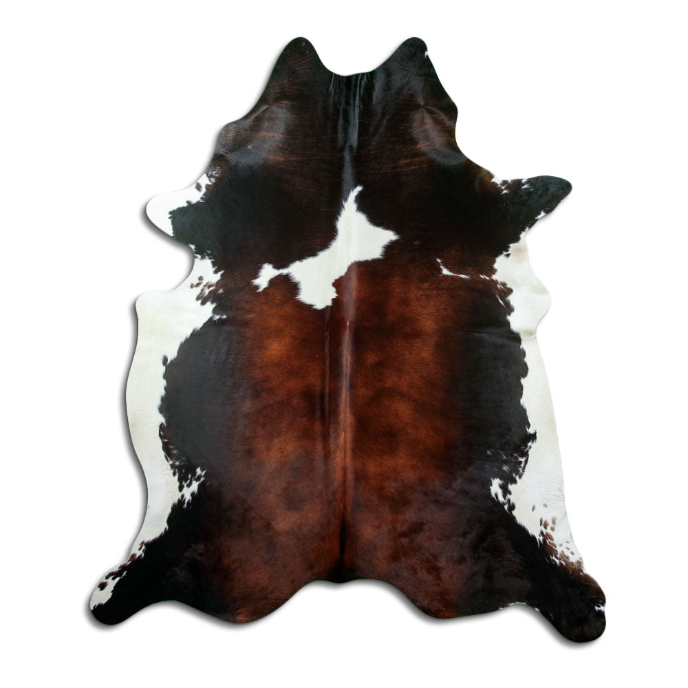 Dreifarbiges Kuhfell, ca. 220 × 190 cm, von oben fotografiert: genau das Fell, das Sie erhalten