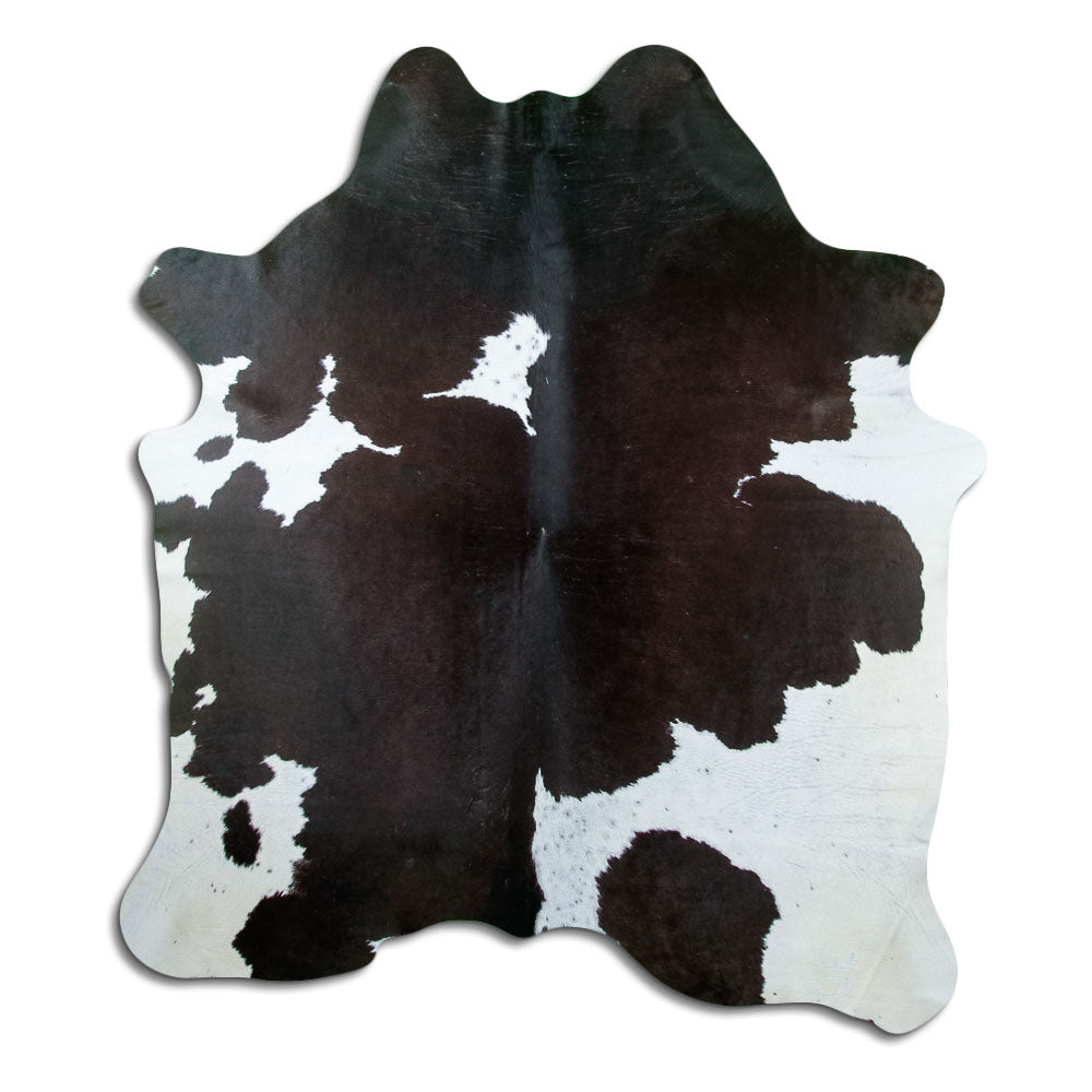 Schwarz-weisses Kuhfell, ca. 200 × 180 cm, von oben fotografiert: genau das Fell, das Sie erhalten