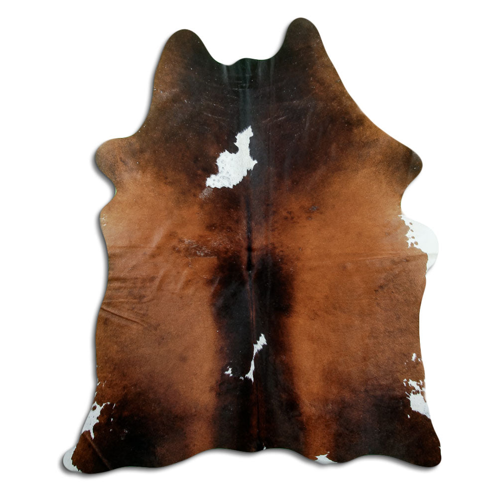 Dreifarbiges Kuhfell, ca. 200 × 160 cm, von oben fotografiert: genau das Fell, das Sie erhalten