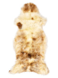 Mehrfarbiges britisches Lammfell, ca. 125 × 55 cm, von oben fotografiert: genau das Fell, das Sie erhalten